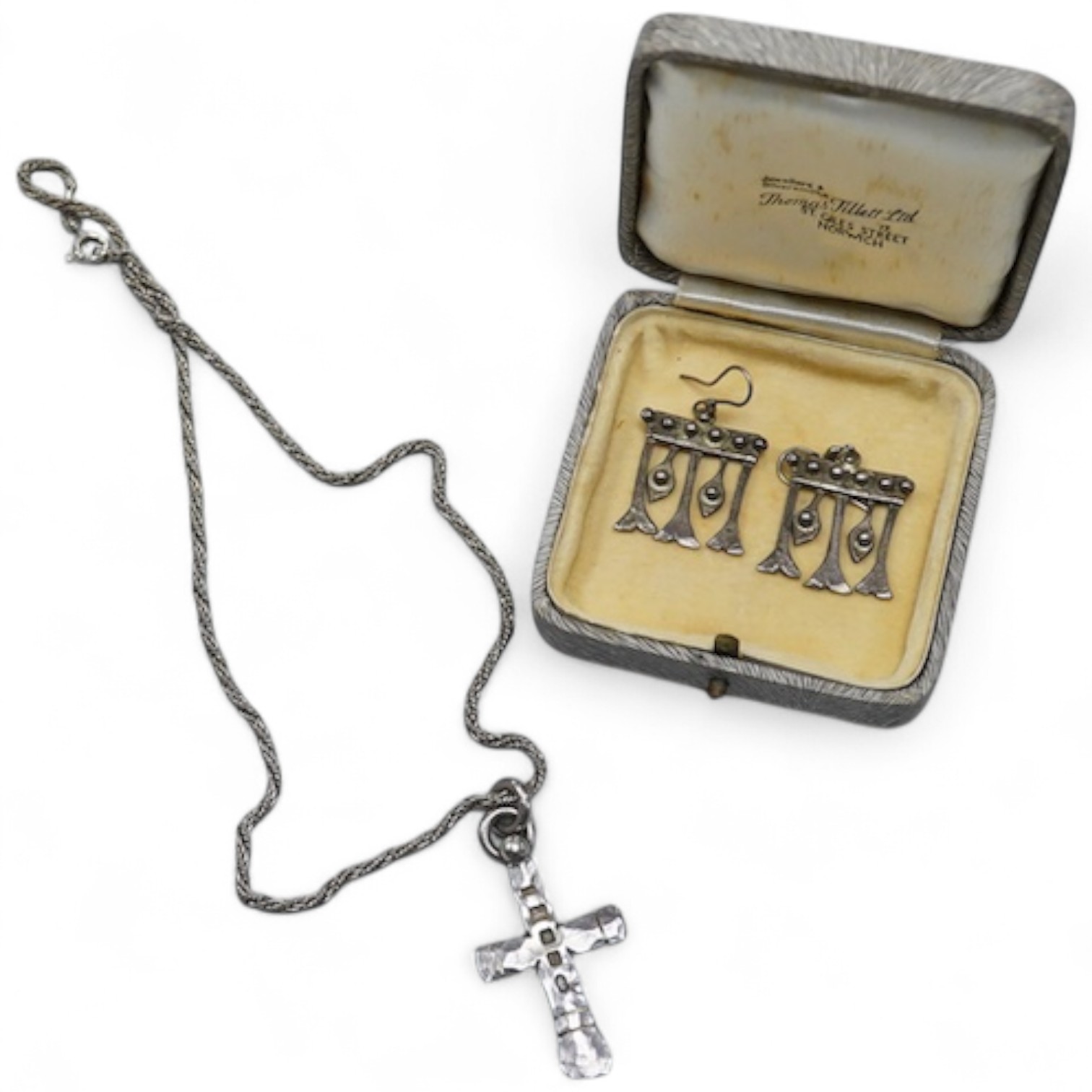 Michael Allen Bolton, a silver cross pendant and a pair of earrings, comprising: a cross pendant of textured design, length 5.1cm, British hallmarks for silver, sponsor's mark MAB, date letter for 1977, on a silver chain